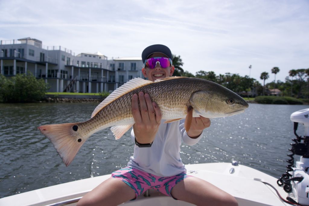 kids learning to fish